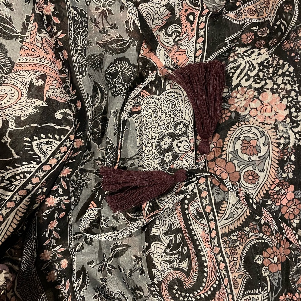 Long sleeve shirt. Has a little shimmer to it(hard to see in pics) never worn